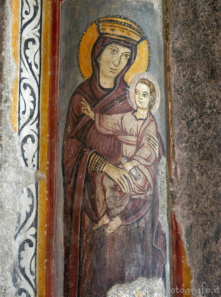 Milan (Italy) - Madonna with Child of the fourteenth century on the fourth left pillar of the Basilica of Sant'Eustorgio